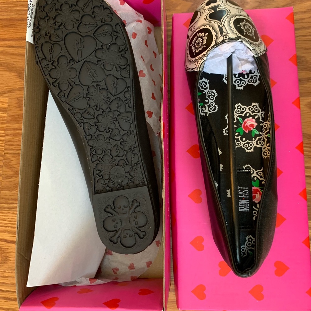 Brand new in the box. Peek a boo iron fist flats